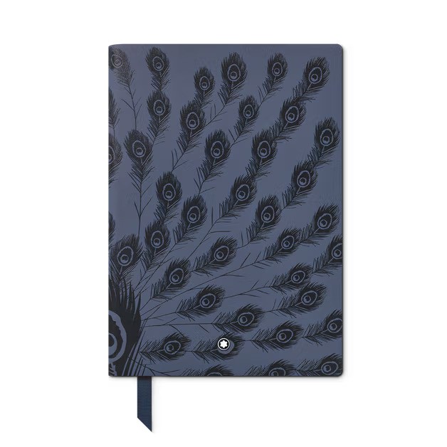 Nav y-blue notebook cover adorned with a repeating peacock feather pattern and a navy ribbon bookmark protruding from the bottom.