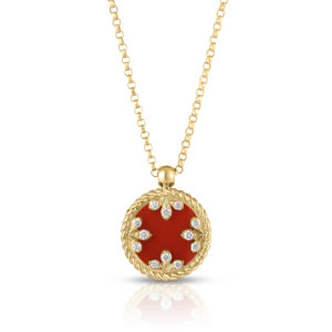 Gold chain necklace featuring a red enamel pendant edged with diamonds in a twisted gold frame.