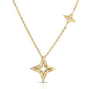 Gold chain necklace with a hollow four-point star pendant featuring diamond accents on a white backdrop.