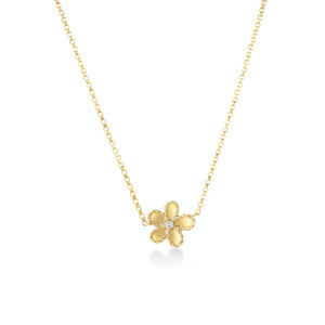 Gold chain necklace with a five-petal flower pendant adorned by a central diamond or gem