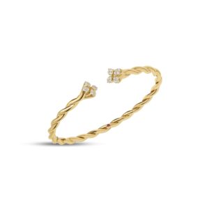 Gold twisted bracelet with diamond-studded end caps, open cuff design.