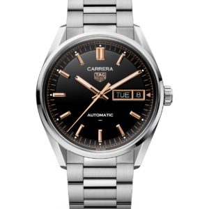 Tag Heuer Carrera automatic wristwatch with black dial, rose-gold hands and markers, stainless steel bracelet, and date window showing Tue 8
