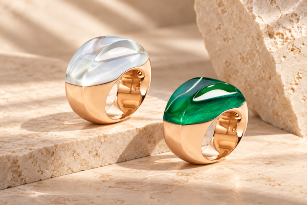 Sculptural Rose Gold Rings on Travertine